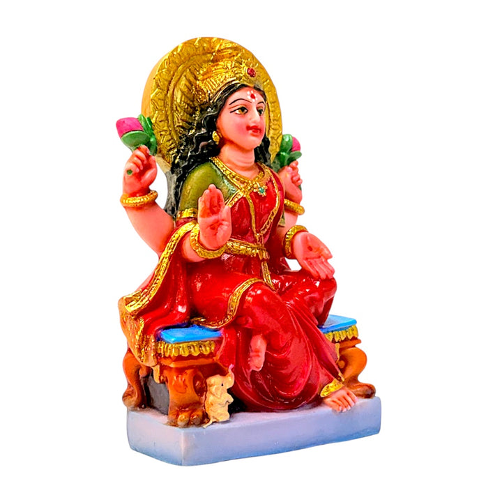 Laxmi on throne, colored, 6 inches