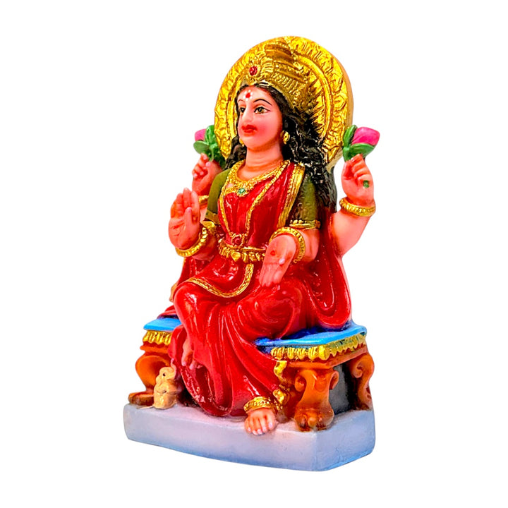 Laxmi on throne, colored, 6 inches
