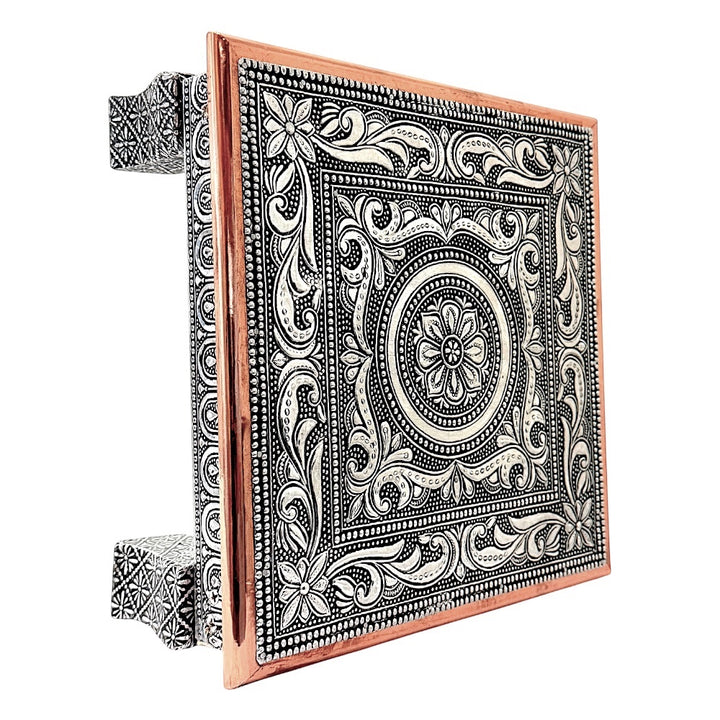 Quality Indian Goods Bajat Oxidised 10 inch square puja table with short legs, featuring intricate floral and paisley patterns in silver and copper.