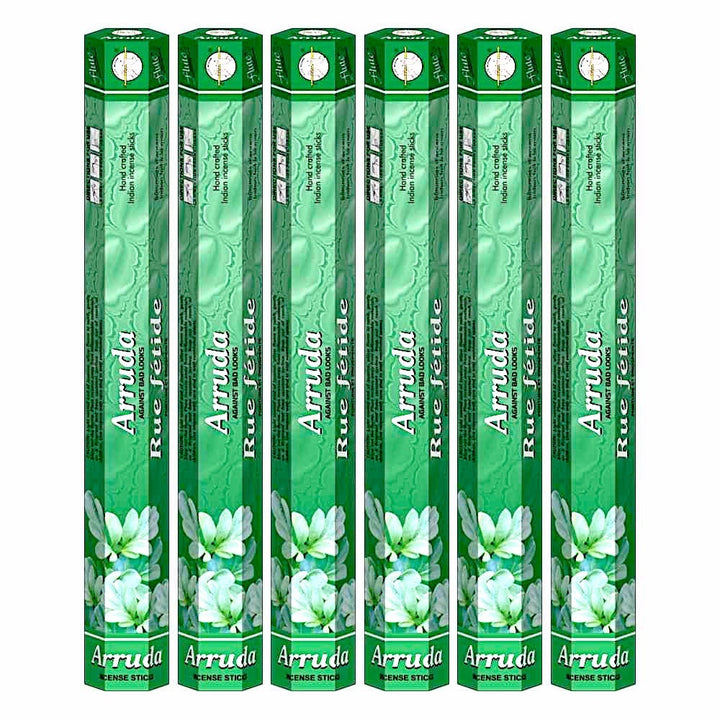 Quality Indian Goods Flute Arruda Rue fétide incense sticks, 6 tubes of 20 sticks each, green packaging with floral design.