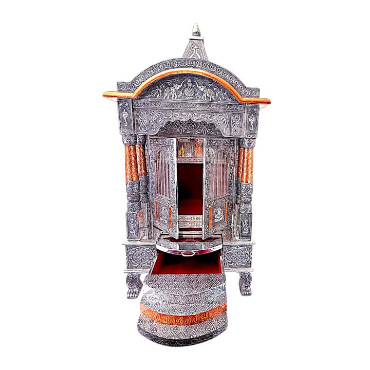 Quality Indian Goods 18-inch oxadized mandir with intricate carvings and copper accents. Features double doors and a red-lined drawer.