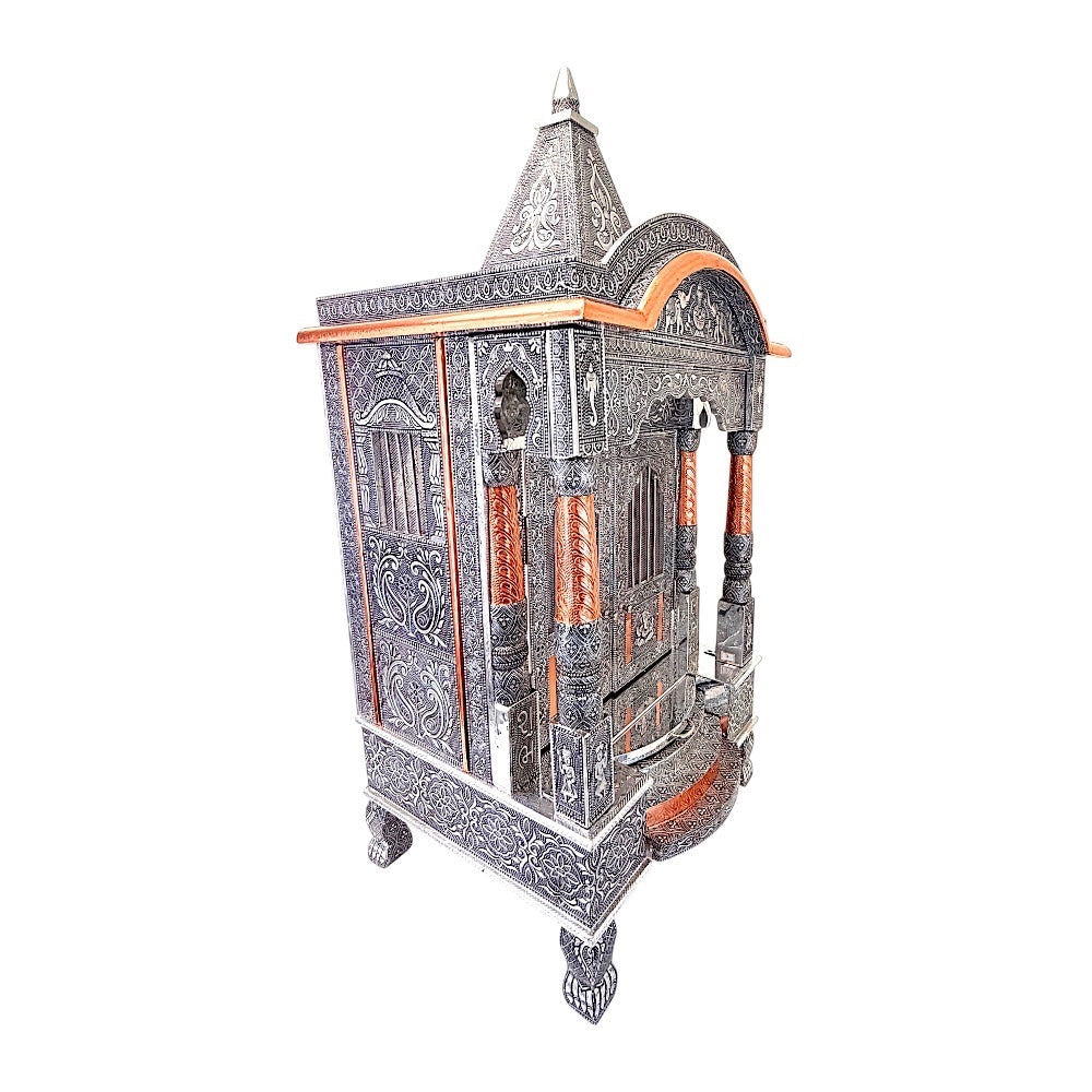 Quality Indian Goods 18-inch wide oxidized metal puja mandir with intricate carvings and copper accents.