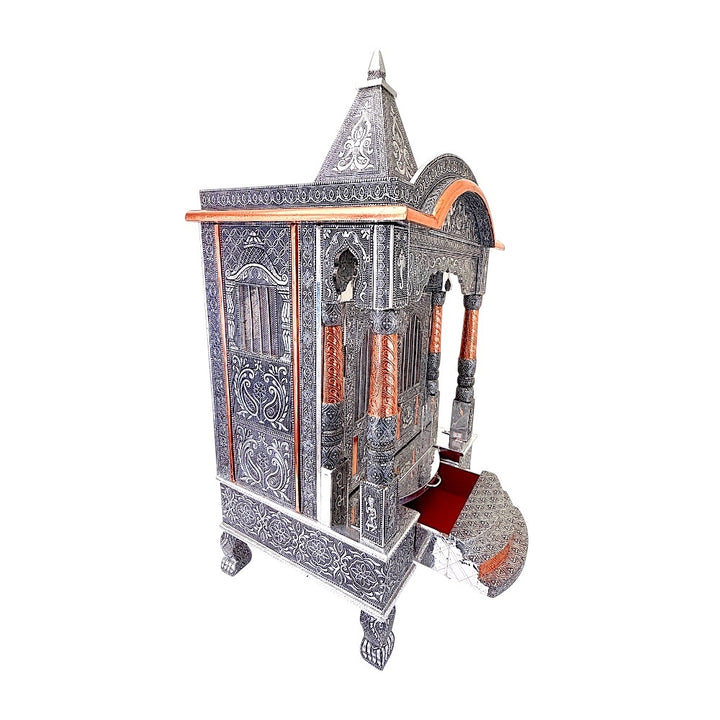 Quality Indian Goods 18-inch oxidized mandir with intricate silver detailing and copper accents. Features a tiered roof and decorative pillars.